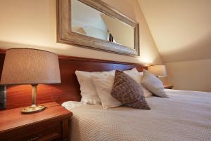 Łóżko lub łóżka w pokoju w obiekcie Grand Hotel Stamary