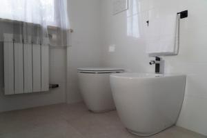 Koupelna v ubytování Le Meraviglie del Conero + 11 fotografií