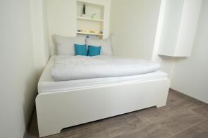 Postel nebo postele na pokoji v ubytování Apartmány Jízdárenská