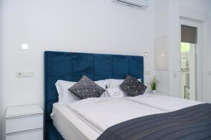 Ένα ή περισσότερα κρεβάτια σε δωμάτιο στο MA Premantura Luxury Apartments Ferienwohnung Unterkunft - Premantura Pula Istria