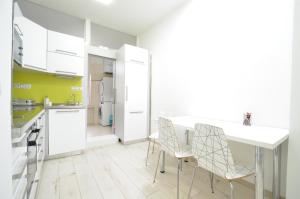 Kuchyň nebo kuchyňský kout v ubytování Apartmány Jízdárenská