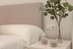 Posteľ alebo postele v izbe v ubytovaní Denia apartment Marina