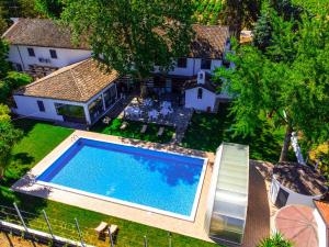 an overhead view of a swimming pool in a yard at Masseria Brica Rossa in Thurio