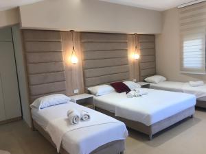 Rúm í herbergi á Apartments Ada Bojana