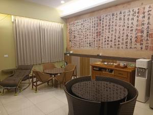 Ruang duduk di 怡然自得-智能主題民宿
