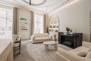 En sittgrupp på HIGHSTAY - Luxury Serviced Apartments - Louvre