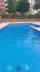 The swimming pool at or close to Bonita vivienda en San Sebastian de los Reyes