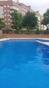 The swimming pool at or close to Bonita vivienda en San Sebastian de los Reyes