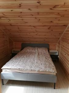 Postel nebo postele na pokoji v ubytování Relax u Agi i Jurka