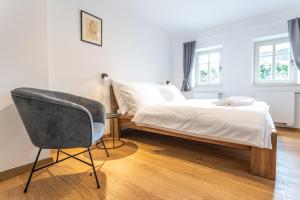 Posteľ alebo postele v izbe v ubytovaní Apartmány VOLF - Boží Dar