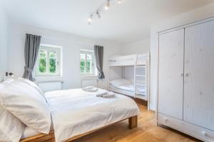 Posteľ alebo postele v izbe v ubytovaní Apartmány VOLF - Boží Dar