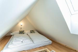 Posteľ alebo postele v izbe v ubytovaní Apartmány VOLF - Boží Dar