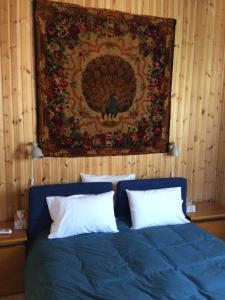 Postel nebo postele na pokoji v ubytování Pervolaris Cottages 1