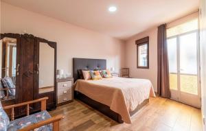 A bed or beds in a room at 3 Bedroom Nice Apartment In A Arnoia