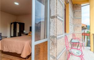 A bed or beds in a room at 3 Bedroom Nice Apartment In A Arnoia