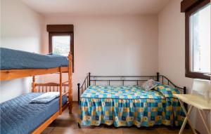 A bed or beds in a room at 3 Bedroom Nice Apartment In A Arnoia