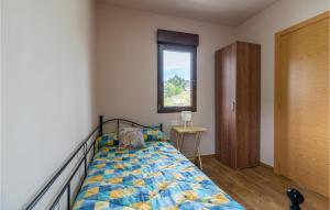 A bed or beds in a room at 3 Bedroom Nice Apartment In A Arnoia