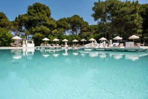 Der Swimmingpool an oder in der Nähe von Baglioni Masseria Muzza Resort & Spa