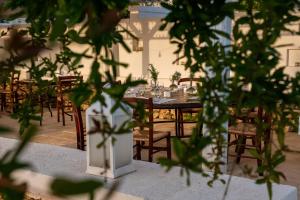 Ein Restaurant oder anderes Speiselokal in der Unterkunft Baglioni Masseria Muzza Resort & Spa 