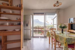 Kuchyň nebo kuchyňský kout v ubytování Le Mirador - Studio avec balcon Vue Lac et Montagnes