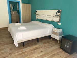 Ένα ή περισσότερα κρεβάτια σε δωμάτιο στο Habitaciones Sajorami Beach