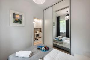 Posteľ alebo postele v izbe v ubytovaní ShortStayPoland Wybrzeże Kościuszkowskie (B24)