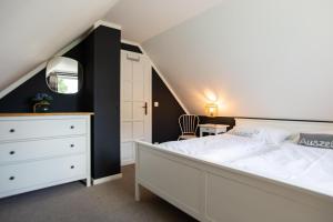 Ένα ή περισσότερα κρεβάτια σε δωμάτιο στο Sonnenwieck 02