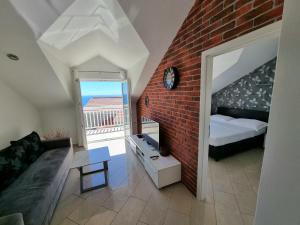 Postel nebo postele na pokoji v ubytování Apartments Kutlic