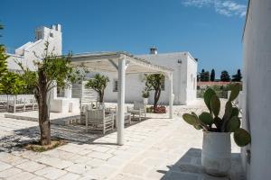 Ein Patio oder anderer Außenbereich in der Unterkunft Baglioni Masseria Muzza Resort & Spa