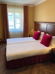 Postel nebo postele na pokoji v ubytování Guest House Pirklių Namai