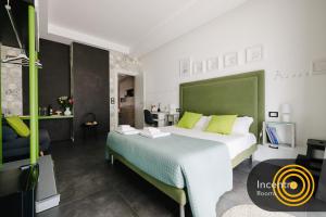 Postel nebo postele na pokoji v ubytování Incentro Rooms