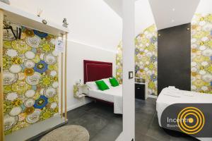 Postel nebo postele na pokoji v ubytování Incentro Rooms