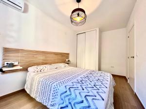 Postel nebo postele na pokoji v ubytování Albir21 Ground floor by Albir Proper Properties + 17 fotografií