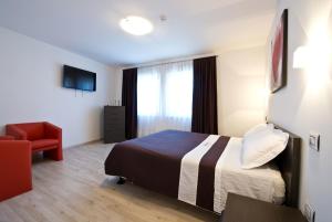 Postel nebo postele na pokoji v ubytování Hotel Cajeta
