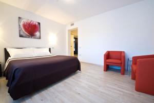 Postel nebo postele na pokoji v ubytování Hotel Cajeta