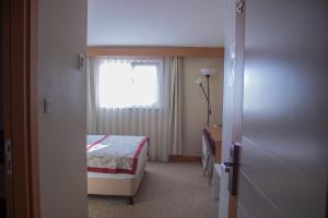 Postel nebo postele na pokoji v ubytování Trakya City Hotel