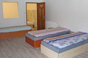 Posteľ alebo postele v izbe v ubytovaní Dusan Apartments