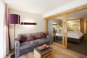 Postel nebo postele na pokoji v ubytování Hotel Walliserstube