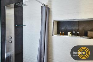 Kuchyň nebo kuchyňský kout v ubytování Incentro Rooms