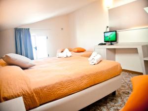 Postel nebo postele na pokoji v ubytování Riviera Mare Beach Life Hotel