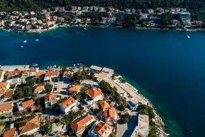 an aerial view of a town next to the water at Brna Three-room apartment near the beach-Zen in Brna