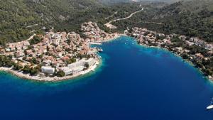 an aerial view of a small island in the water at Brna Three-room apartment near the beach-Zen in Brna