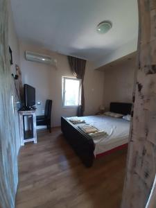 Postel nebo postele na pokoji v ubytování Casa de Laza Apartments