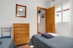 Posteľ alebo postele v izbe v ubytovaní Apartamento Azucenas