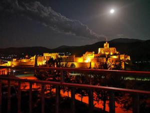 a view of a castle at night at Hotel Rabati in Akhaltsikhe