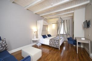 TV a/nebo společenská místnost v ubytování Hotel Charleston