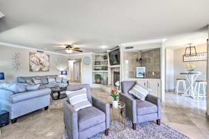 a living room with a couch and two chairs at Beachy Hot Springs Condo with On-Site Lake Access! in Hot Springs