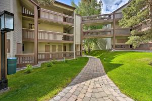 an apartment building with a walkway in front of it at All-Season Sun Valley Retreat with Deck and Grill in Sun Valley