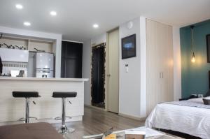 Krevet ili kreveti u jedinici u okviru objekta Apartahotel Millennials