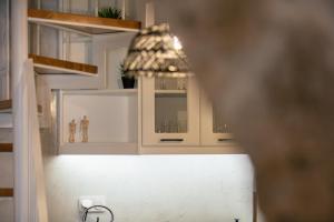 A kitchen or kitchenette at Petrino Two-Bedroom House in Mirthios